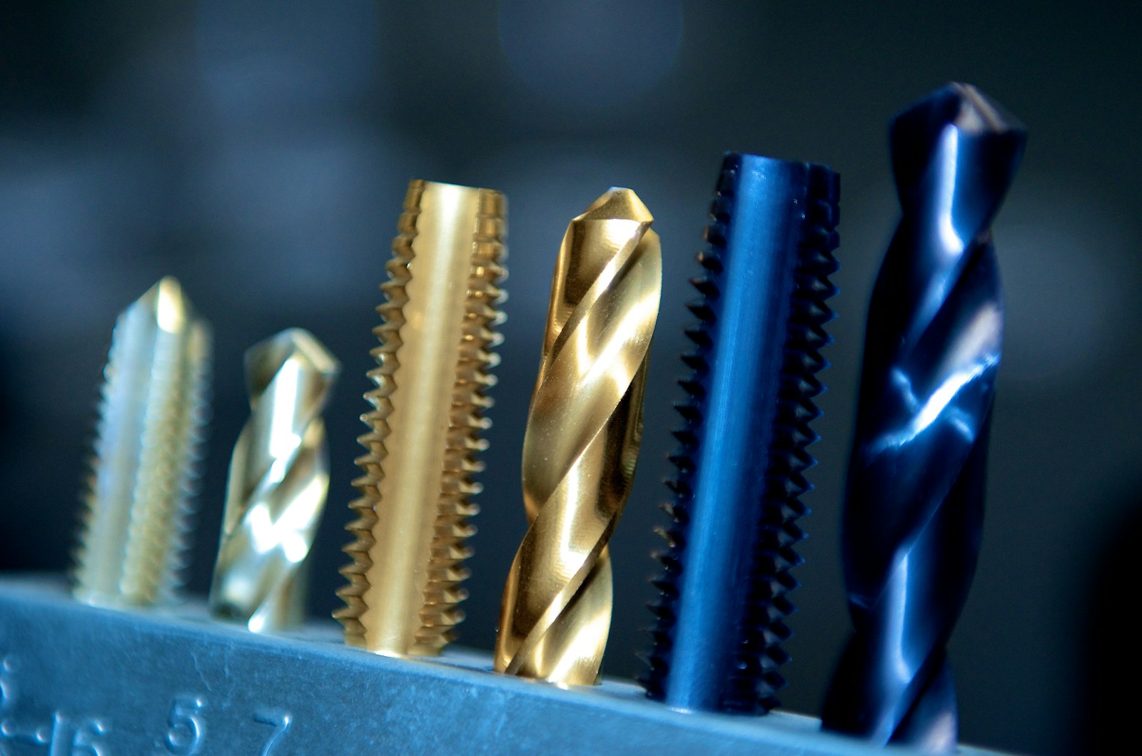 Close-up of coated end mills and cutting tools